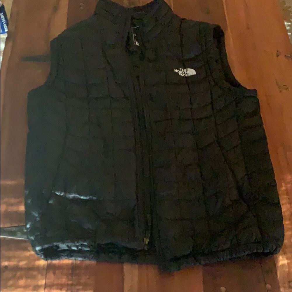 Men’s north face vest sz small